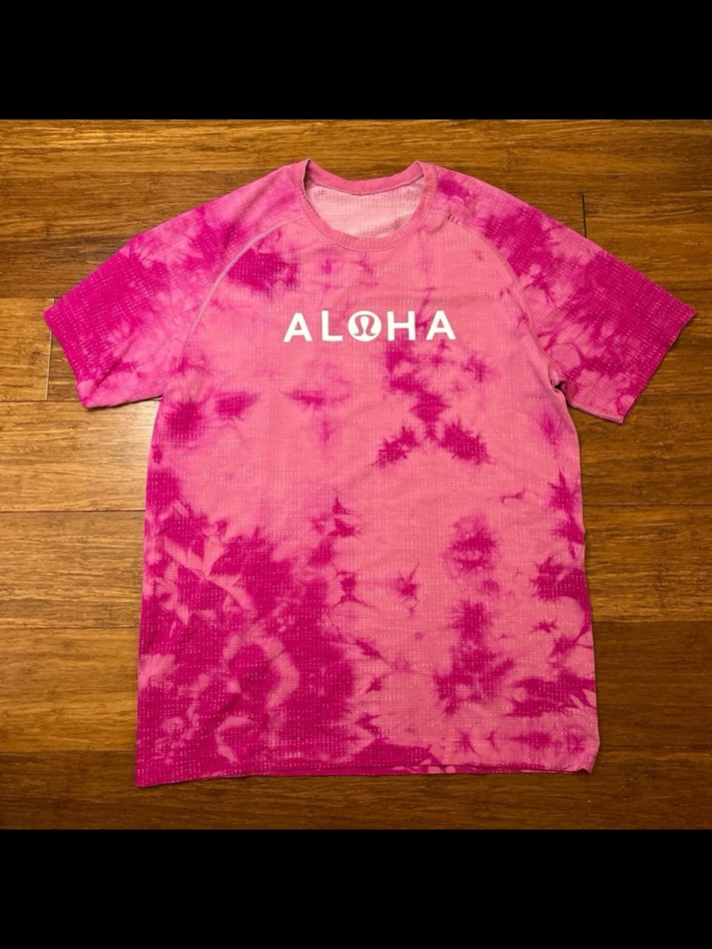 Lululemon size M men’s Hawaii exclusive pink aloha short sleeve athletic shirt.